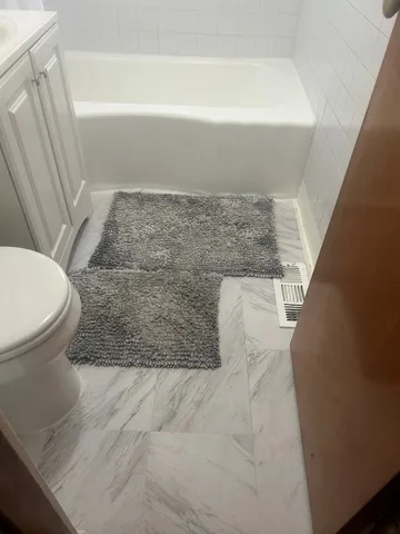 a bathroom with a sink and a toilet