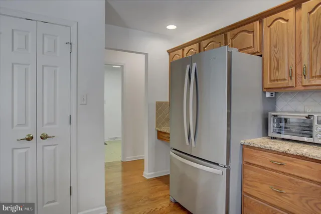 a kitchen with sink and cabinets