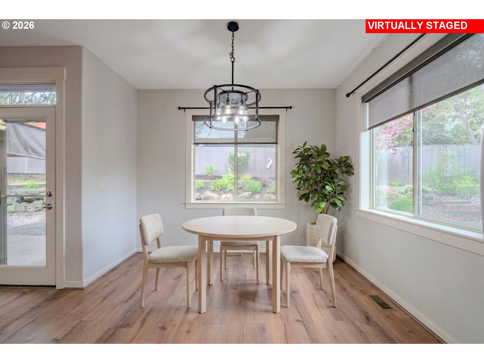 2156 Southwest 14th Drive Gresham, OR 97080 - Photo 11 of 48 a view of a dining room with furniture window and outside view