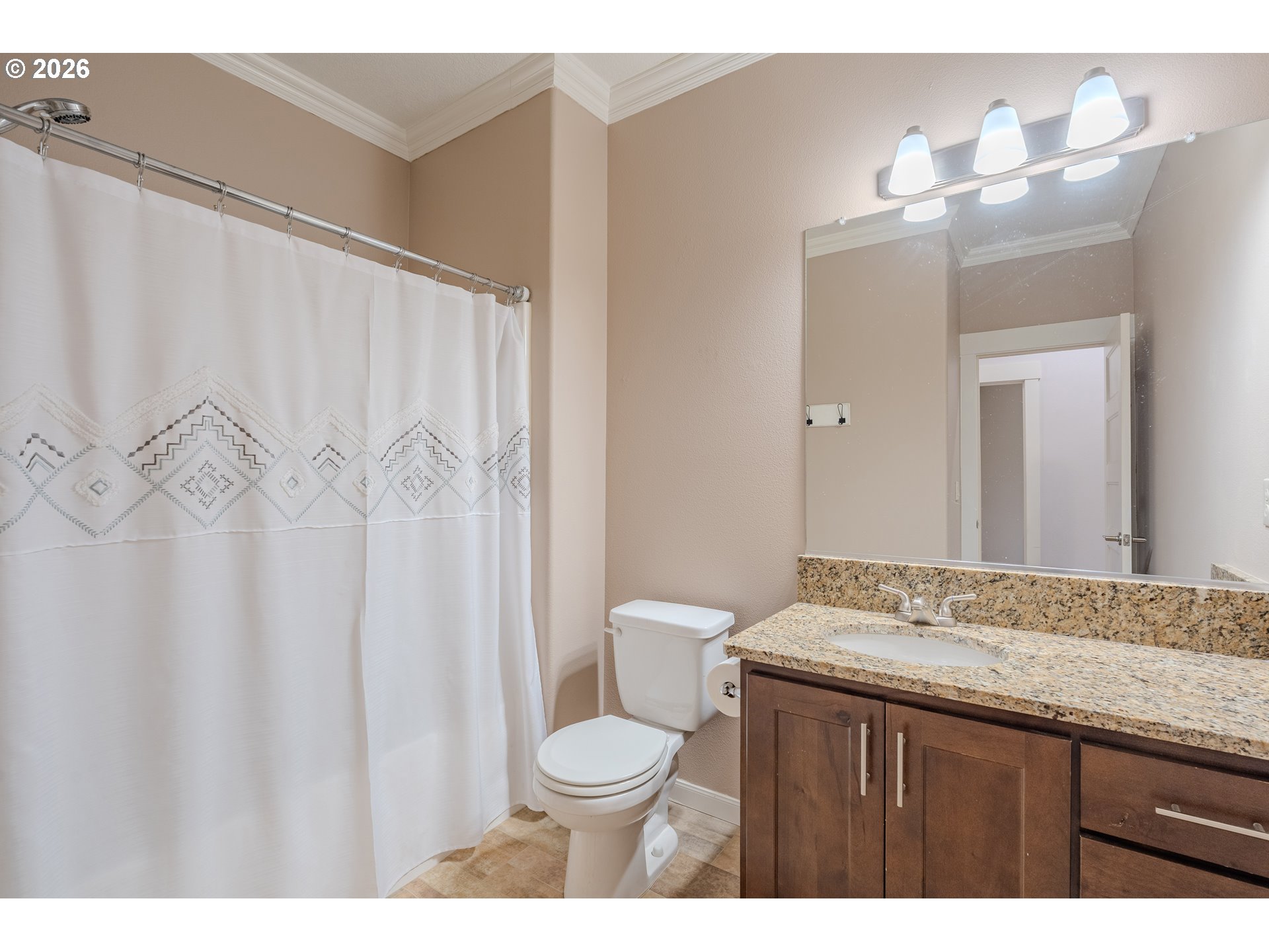 2156 Southwest 14th Drive Gresham, OR 97080 - Photo 17 of 48 a bathroom with a granite countertop sink toilet and a mirror