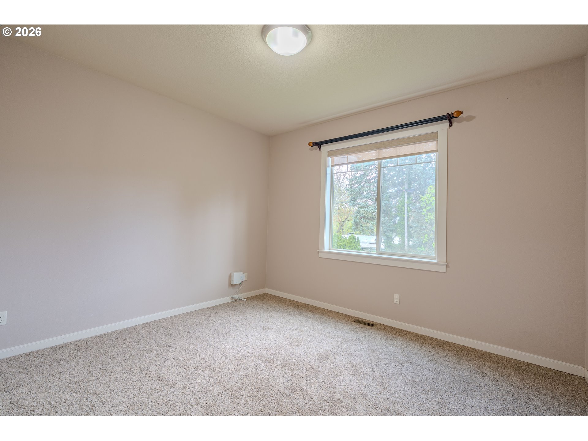 2156 Southwest 14th Drive Gresham, OR 97080 - Photo 24 of 48 a view of an empty room with a window