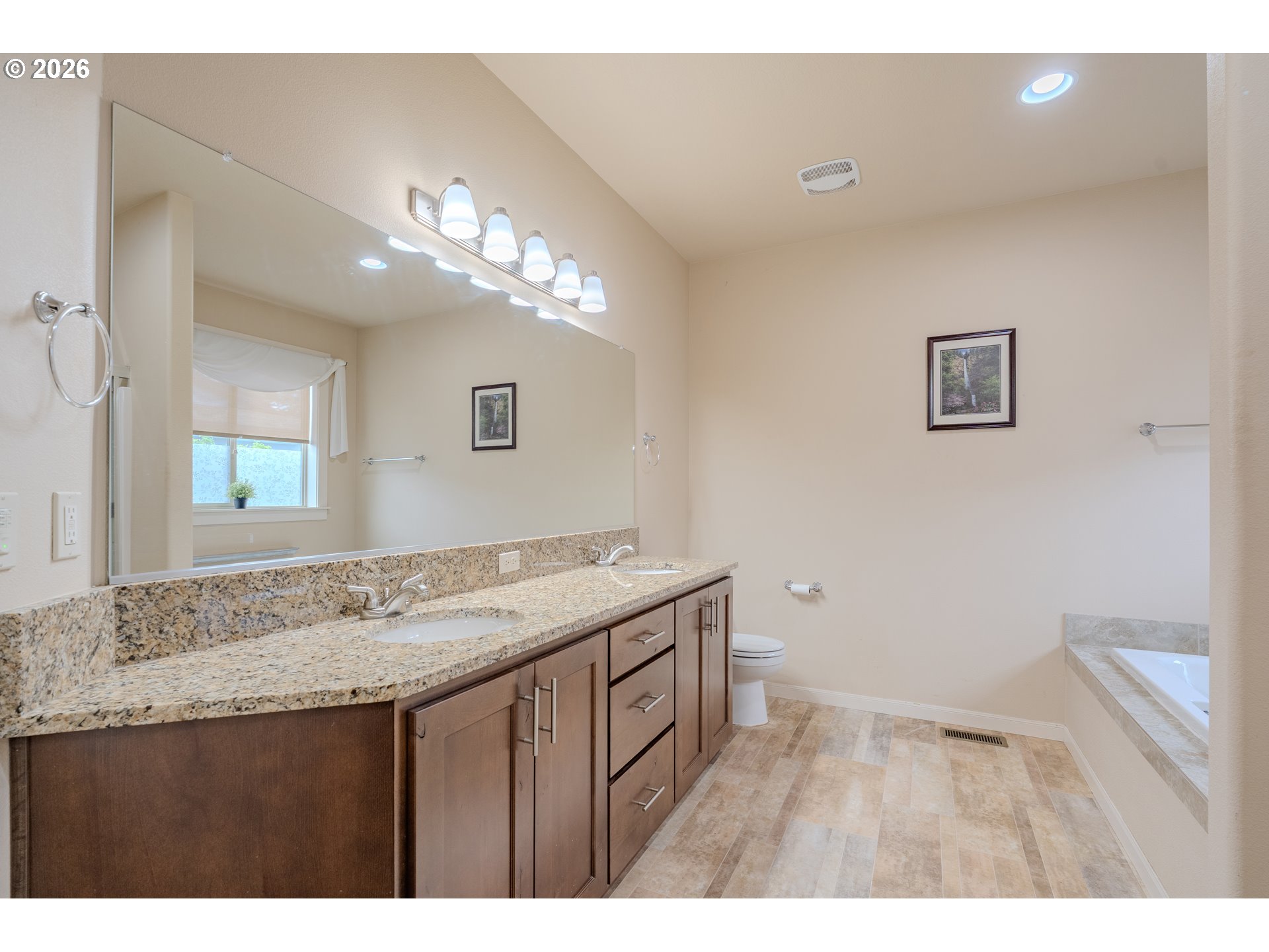2156 Southwest 14th Drive Gresham, OR 97080 - Photo 31 of 48 a bathroom with a sink a vanity and a mirror