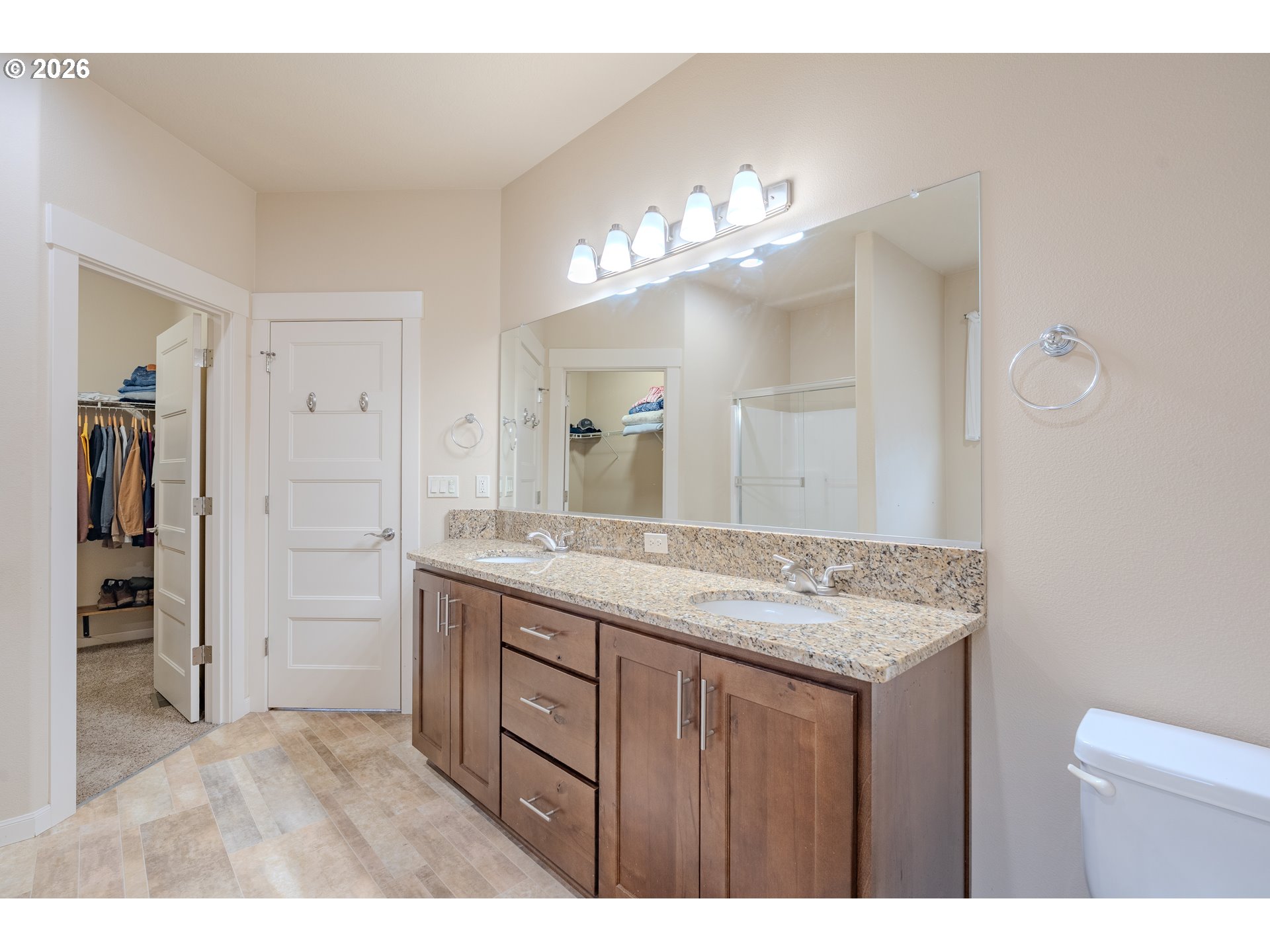 2156 Southwest 14th Drive Gresham, OR 97080 - Photo 34 of 48 a bathroom with a sink a vanity and a mirror