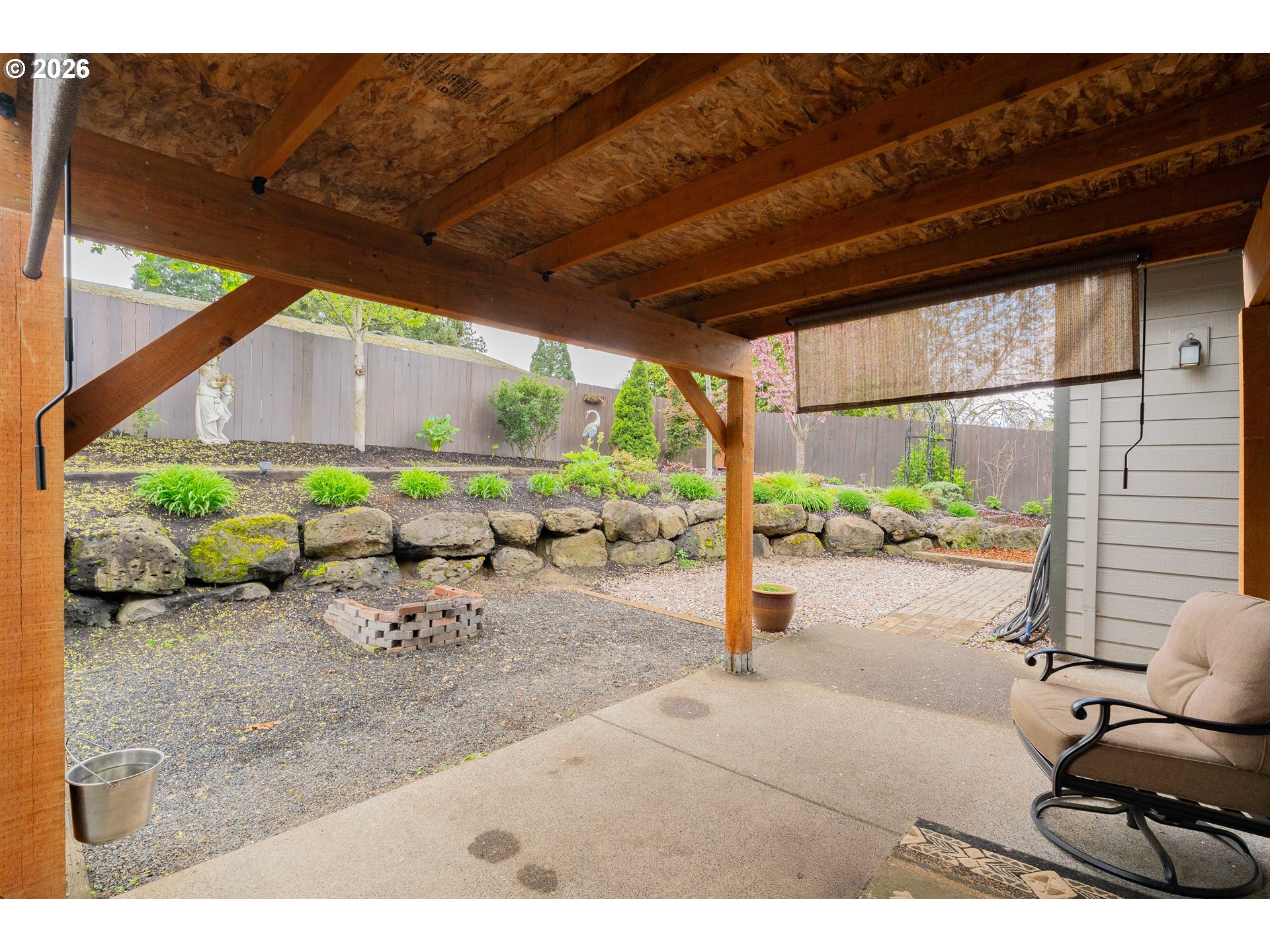 2156 Southwest 14th Drive Gresham, OR 97080 - Photo 35 of 48 a backyard of a house with a table and chairs