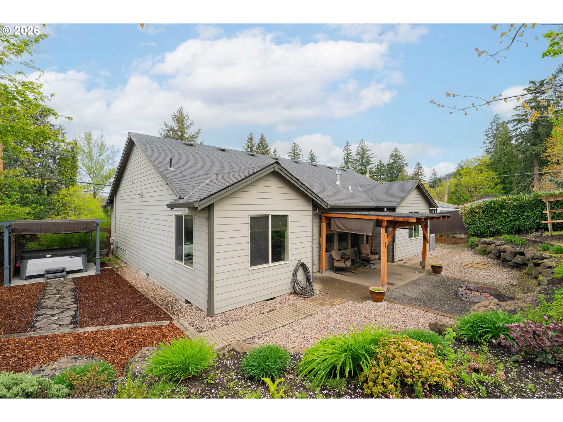 2156 Southwest 14th Drive Gresham, OR 97080 - Photo 39 of 48 a view of a house with backyard and garden