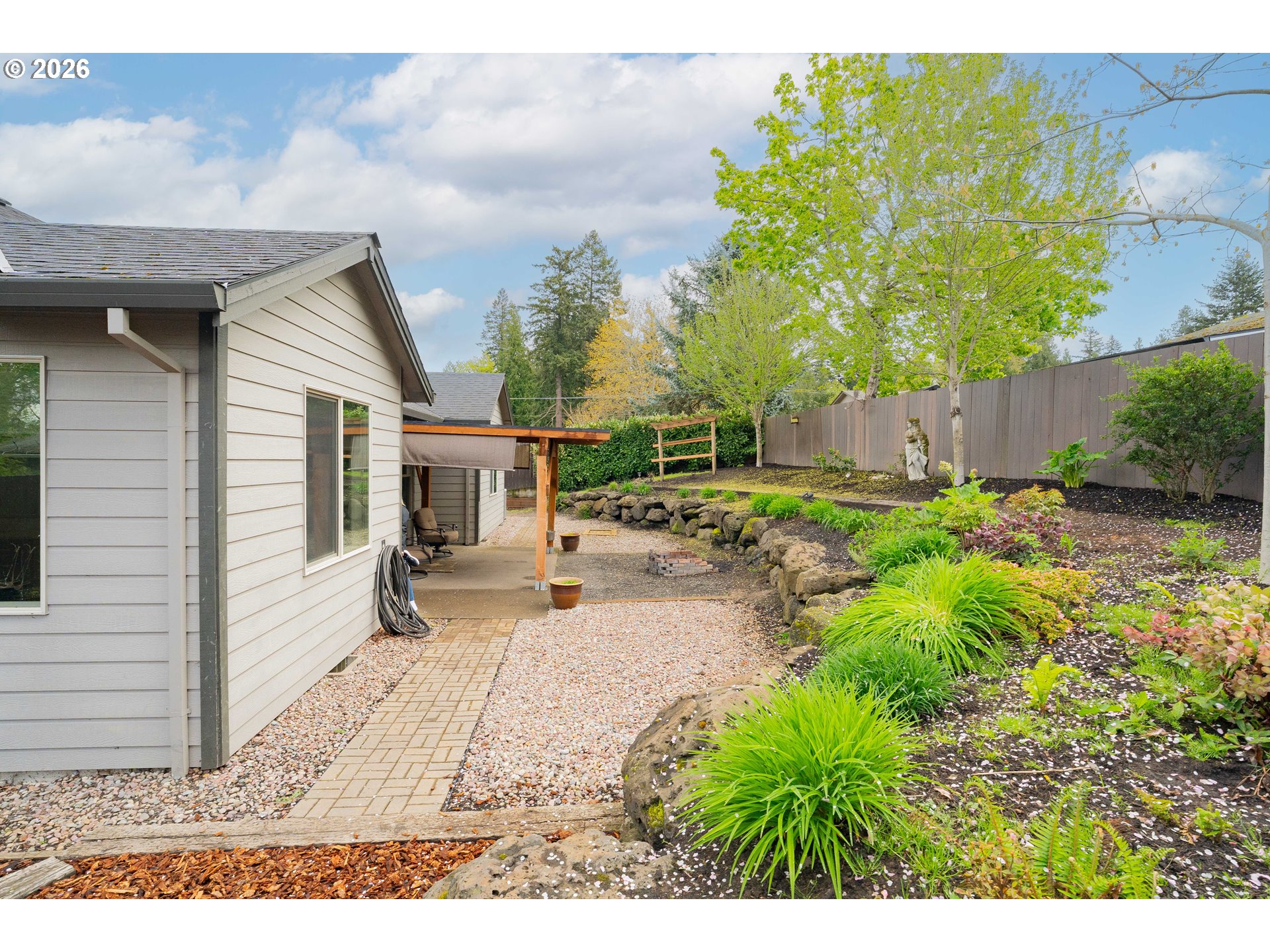 2156 Southwest 14th Drive Gresham, OR 97080 - Photo 40 of 48 a view of a house with backyard and sitting area