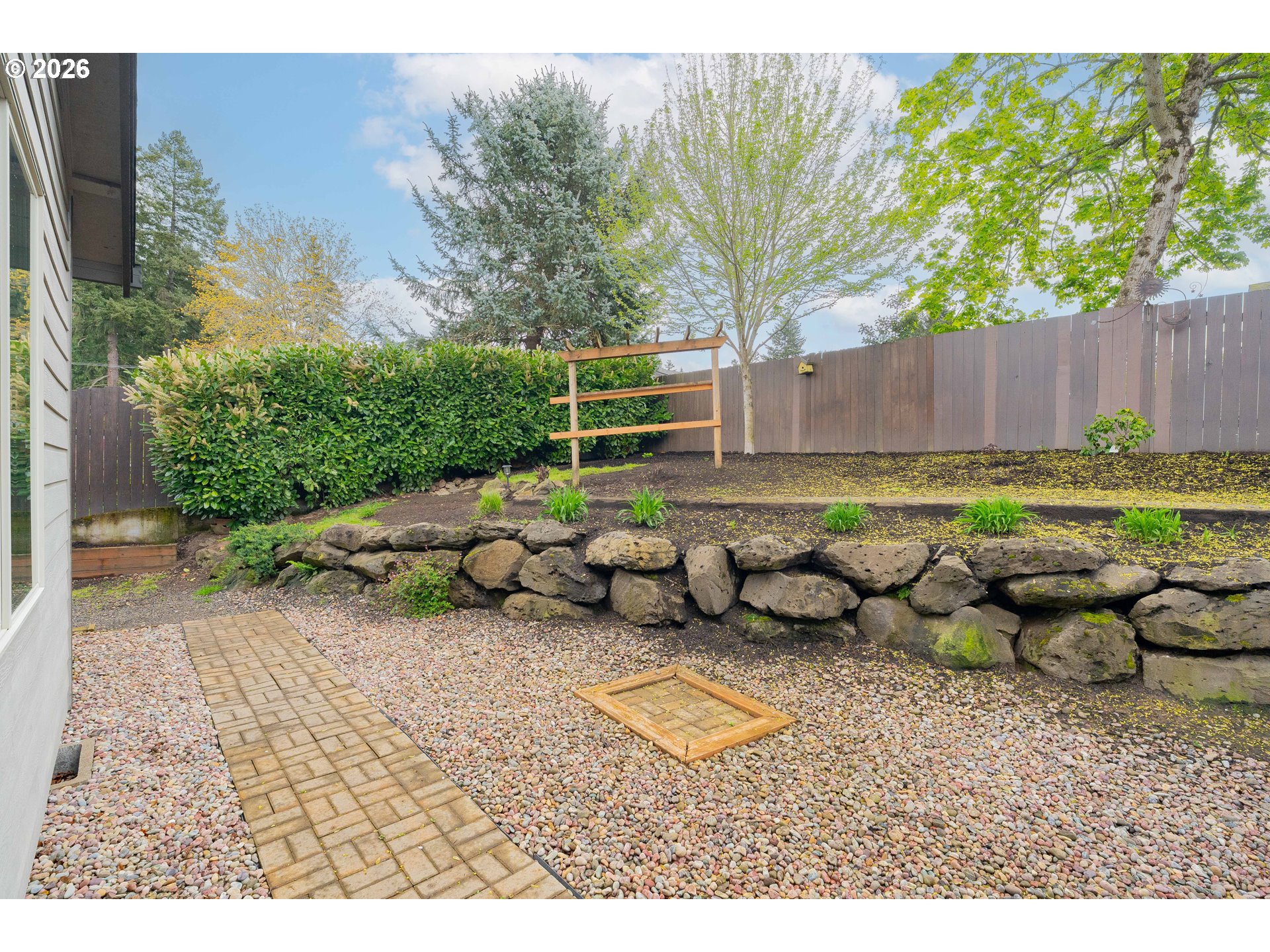 2156 Southwest 14th Drive Gresham, OR 97080 - Photo 42 of 48 a backyard of a house with table and chairs