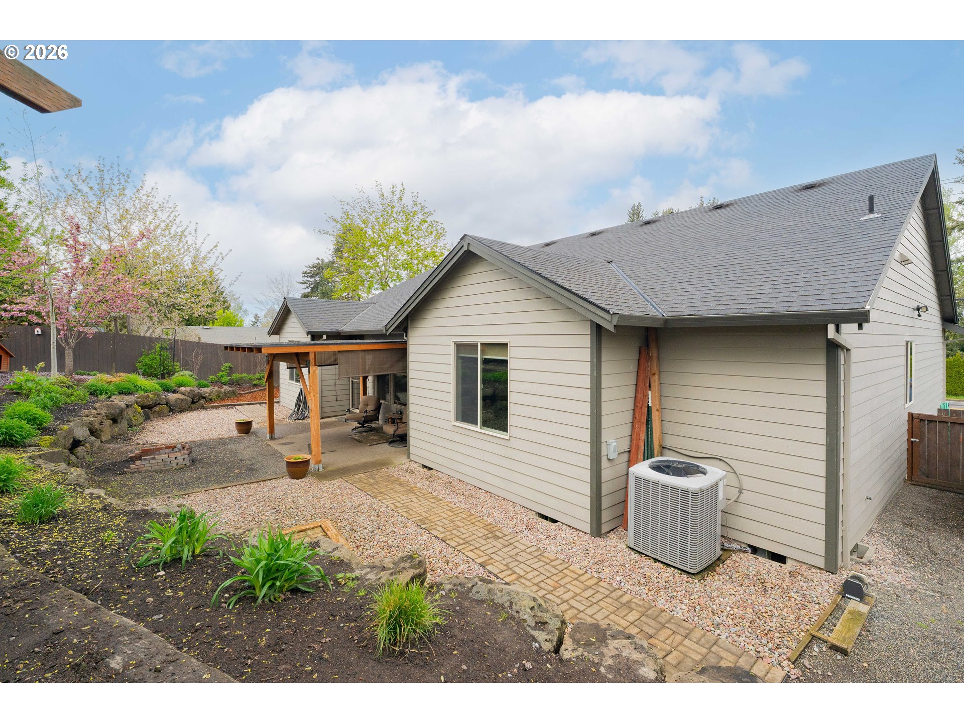 2156 Southwest 14th Drive Gresham, OR 97080 - Photo 43 of 48 a view of a backyard with plants and large tree
