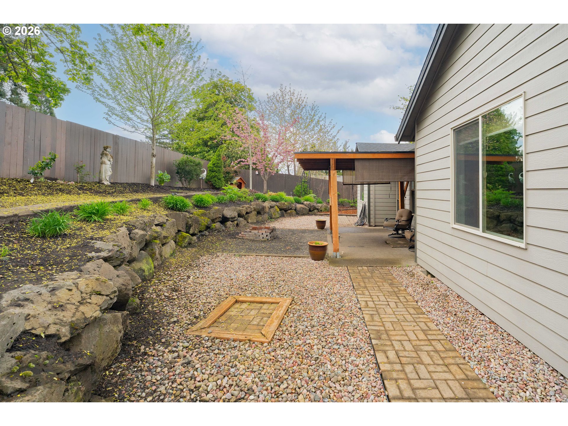 2156 Southwest 14th Drive Gresham, OR 97080 - Photo 46 of 48 a view of a backyard with sitting area