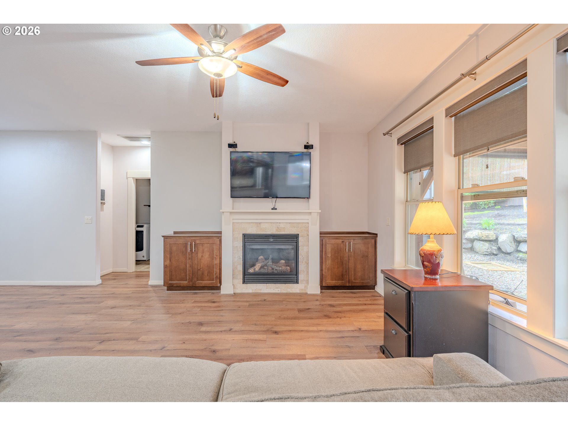 2156 Southwest 14th Drive Gresham, OR 97080 - Photo 5 of 48 a living room with furniture and a fireplace