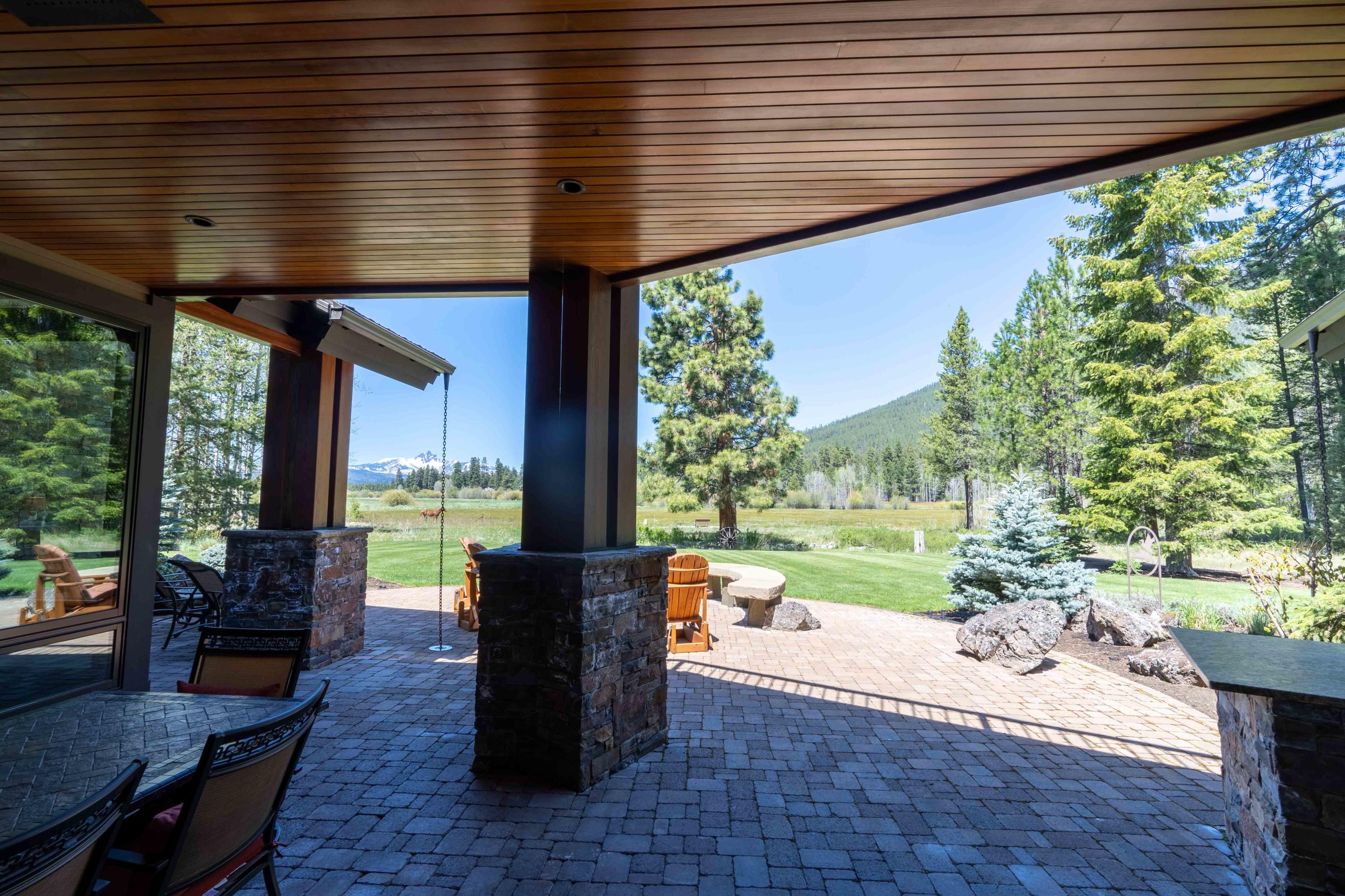 13778 Bishops Cap, Unit EM 8 Black Butte Ranch, OR 97759 - Photo 22 of 27 Heated patio offers space for large dining table.