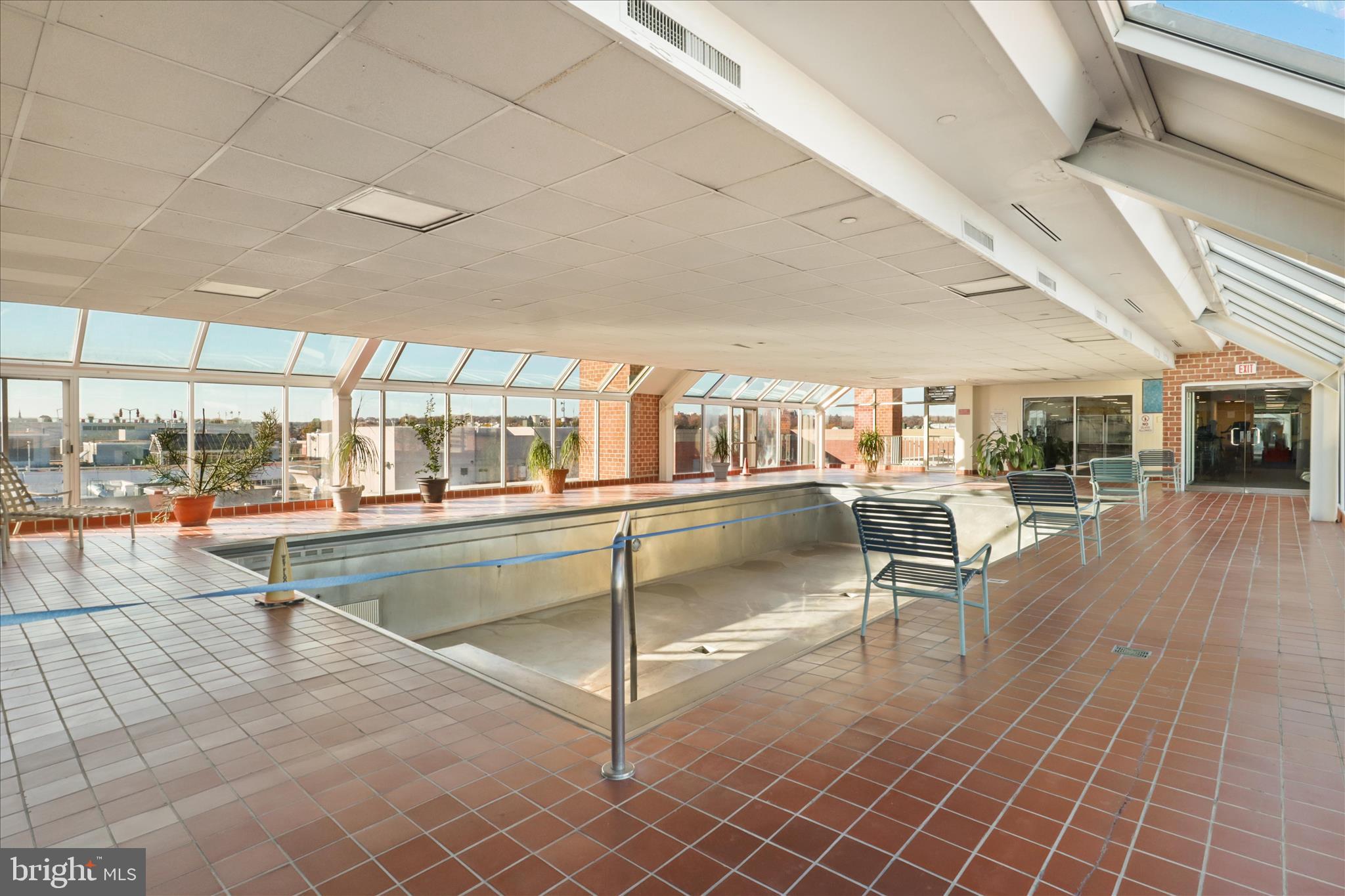 1230 23rd Street Northwest, Unit 918 Washington, DC 20037 - Photo 23 of 30 a view of a swimming pool with outdoor seating