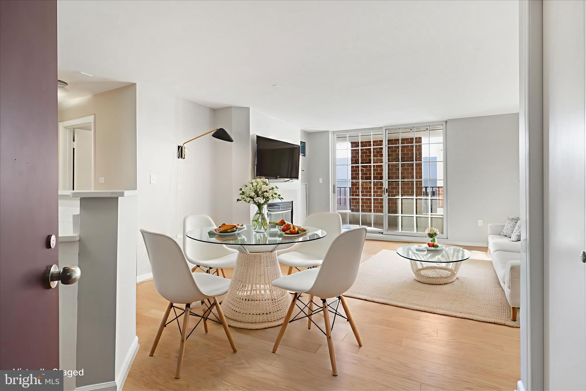 1230 23rd Street Northwest, Unit 918 Washington, DC 20037 - Photo 4 of 30 a view of a dining room with furniture and window