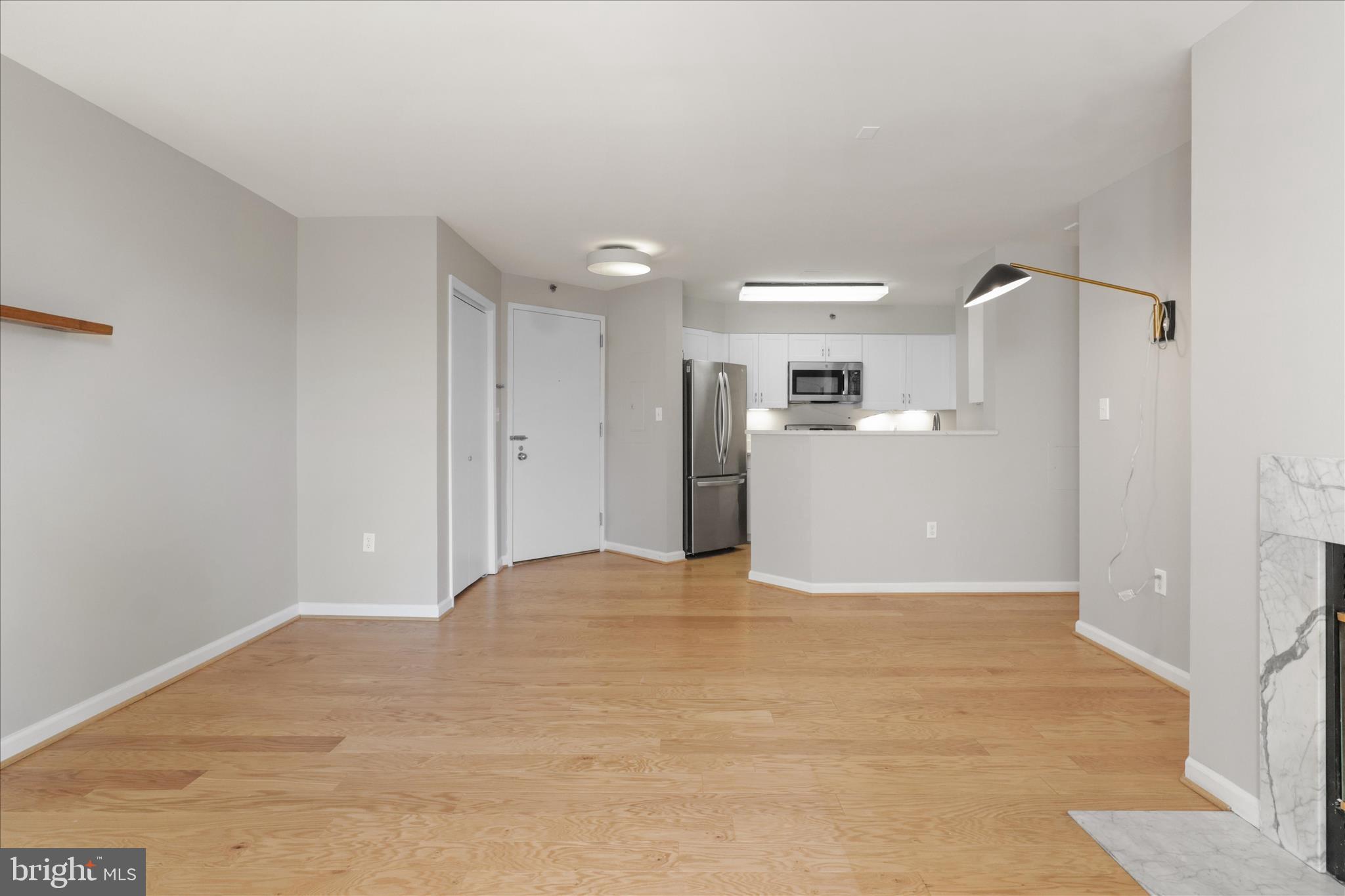 1230 23rd Street Northwest, Unit 918 Washington, DC 20037 - Photo 8 of 30 a view of a kitchen with a refrigerator