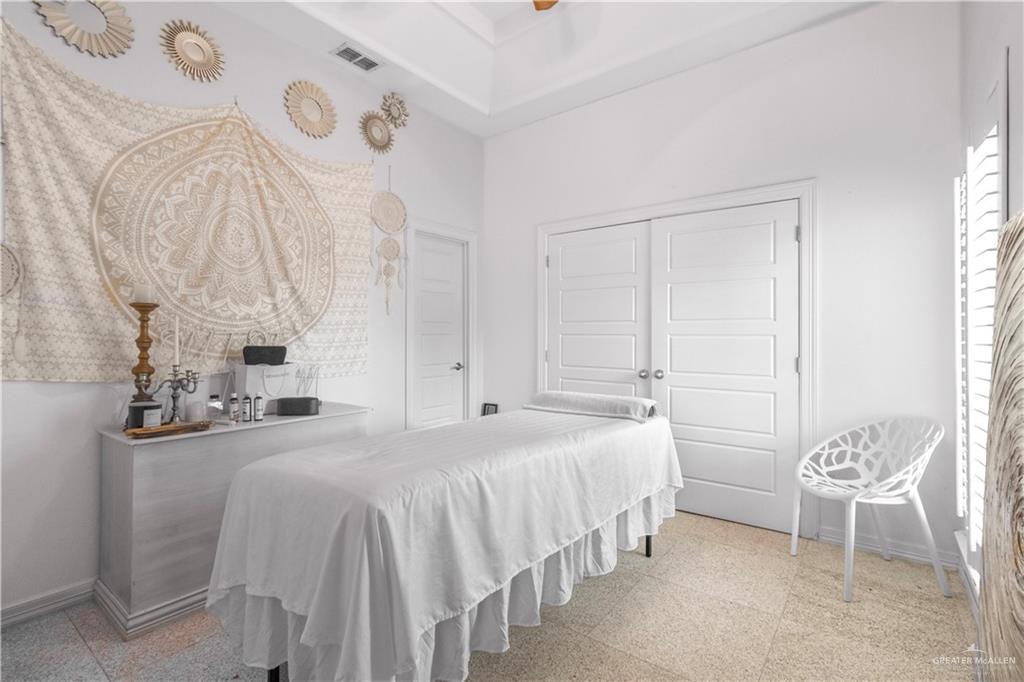 2806 Santa Laura Mission, TX 78572 - Photo 20 of 43 a bedroom with a bed and a table