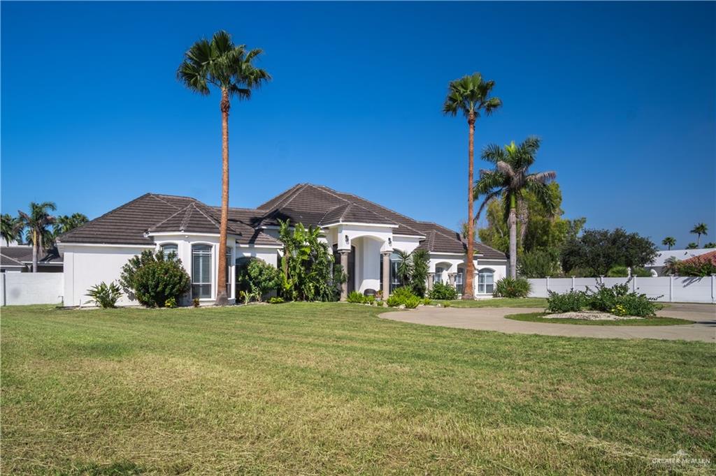 2806 Santa Laura Mission, TX 78572 - Photo 2 of 43 a front view of a house with a yard