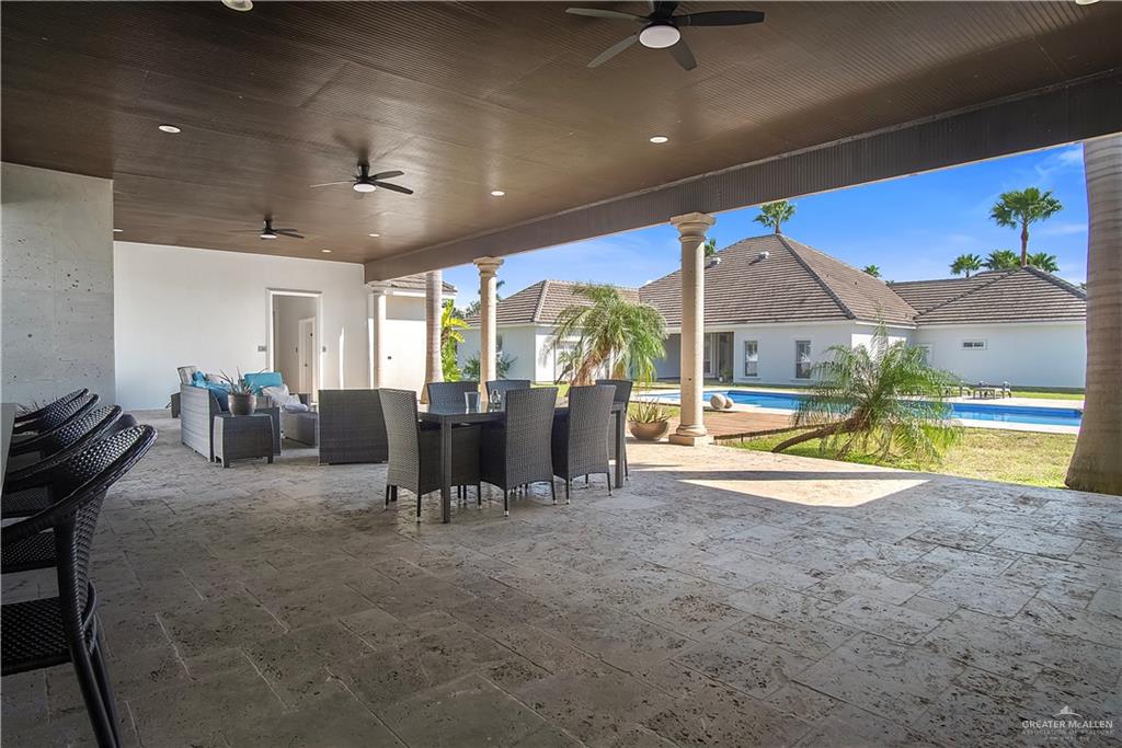 2806 Santa Laura Mission, TX 78572 - Photo 27 of 43 a view of living room with furniture and floor to ceiling window
