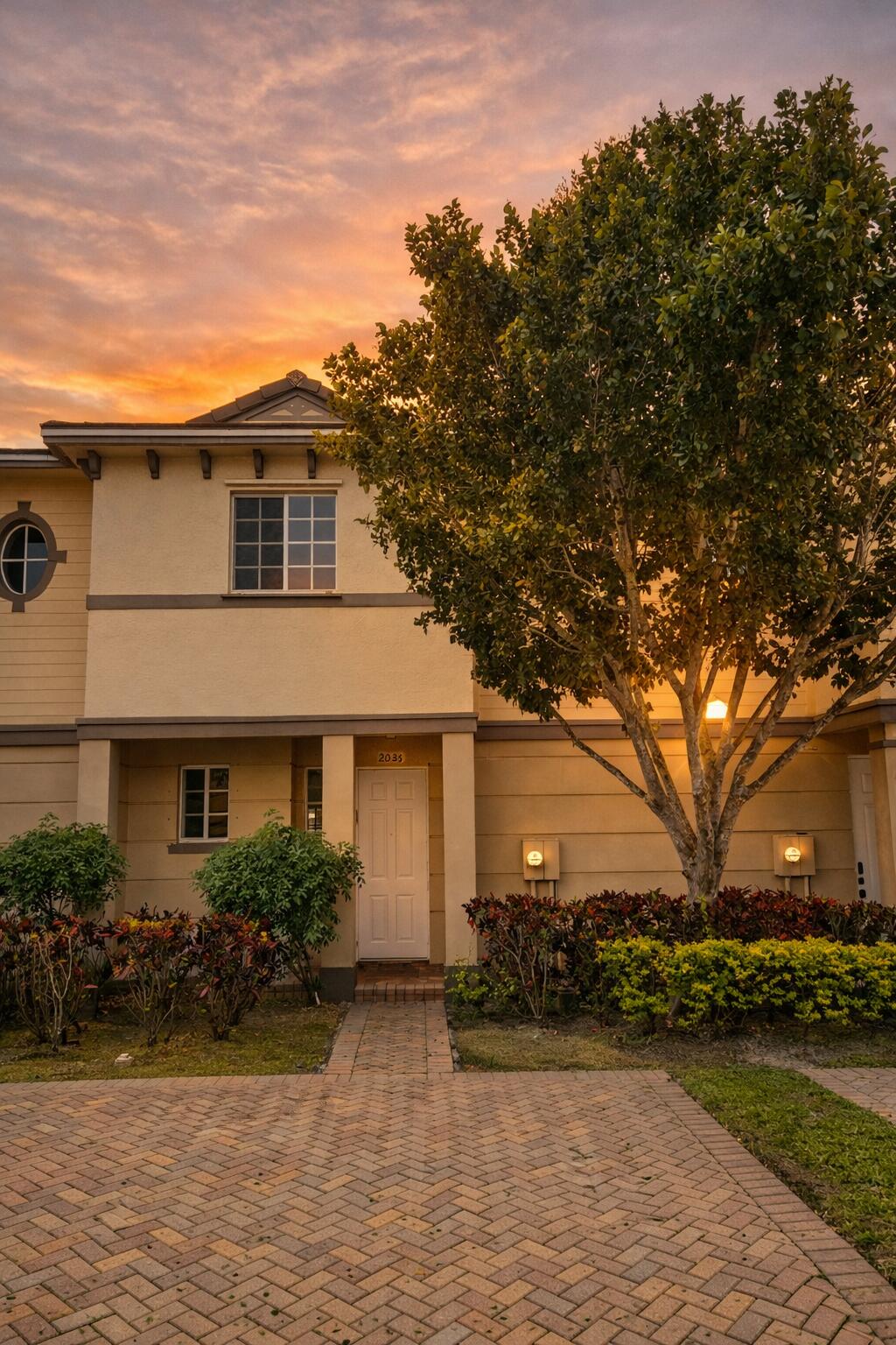 2035 Nassau Drive Riviera Beach, FL 33404 - Photo 11 of 14 Front with sunset