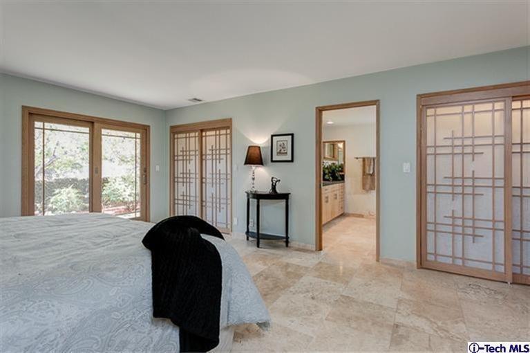 2238 Rim Road Bradbury, CA 91008 - Photo 14 of 27 a living room with furniture and large windows