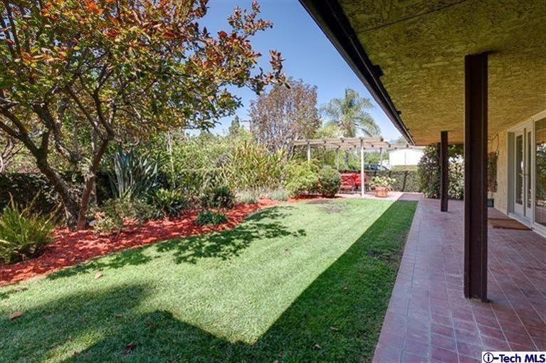 2238 Rim Road Bradbury, CA 91008 - Photo 22 of 27 a view of a house with a backyard and garden