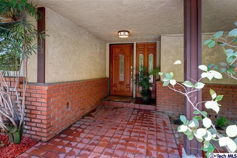 2238 Rim Road Bradbury, CA 91008 - Photo 5 of 27 a view of a bunch of flowers in front of house