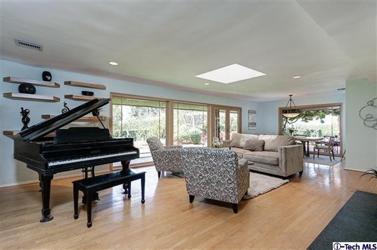 2238 Rim Road Bradbury, CA 91008 - Photo 6 of 27 a living room with furniture and a piano