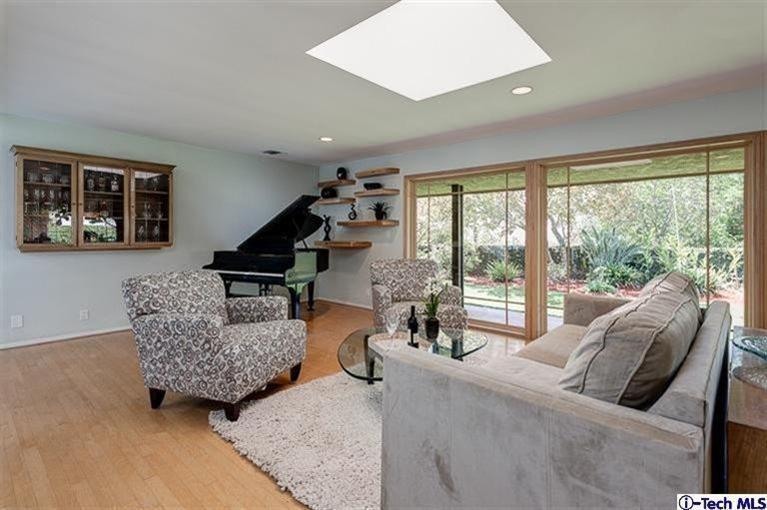 2238 Rim Road Bradbury, CA 91008 - Photo 7 of 27 a living room with furniture and floor to ceiling windows