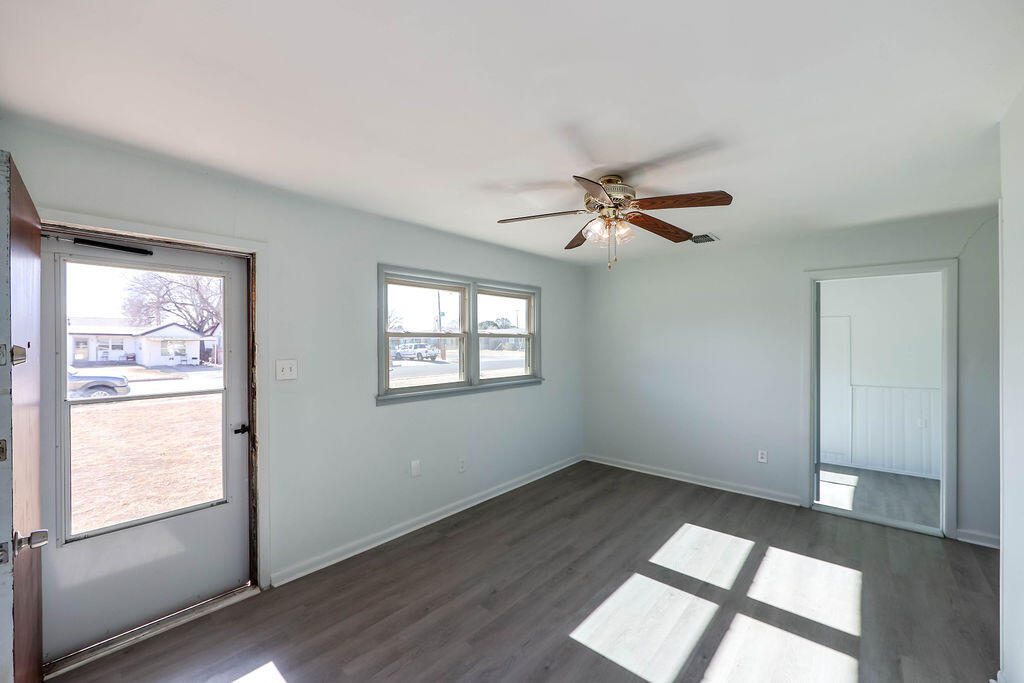 532 54th Street Lubbock, TX 79404 - Photo 4 of 19 a view of an empty room with a window