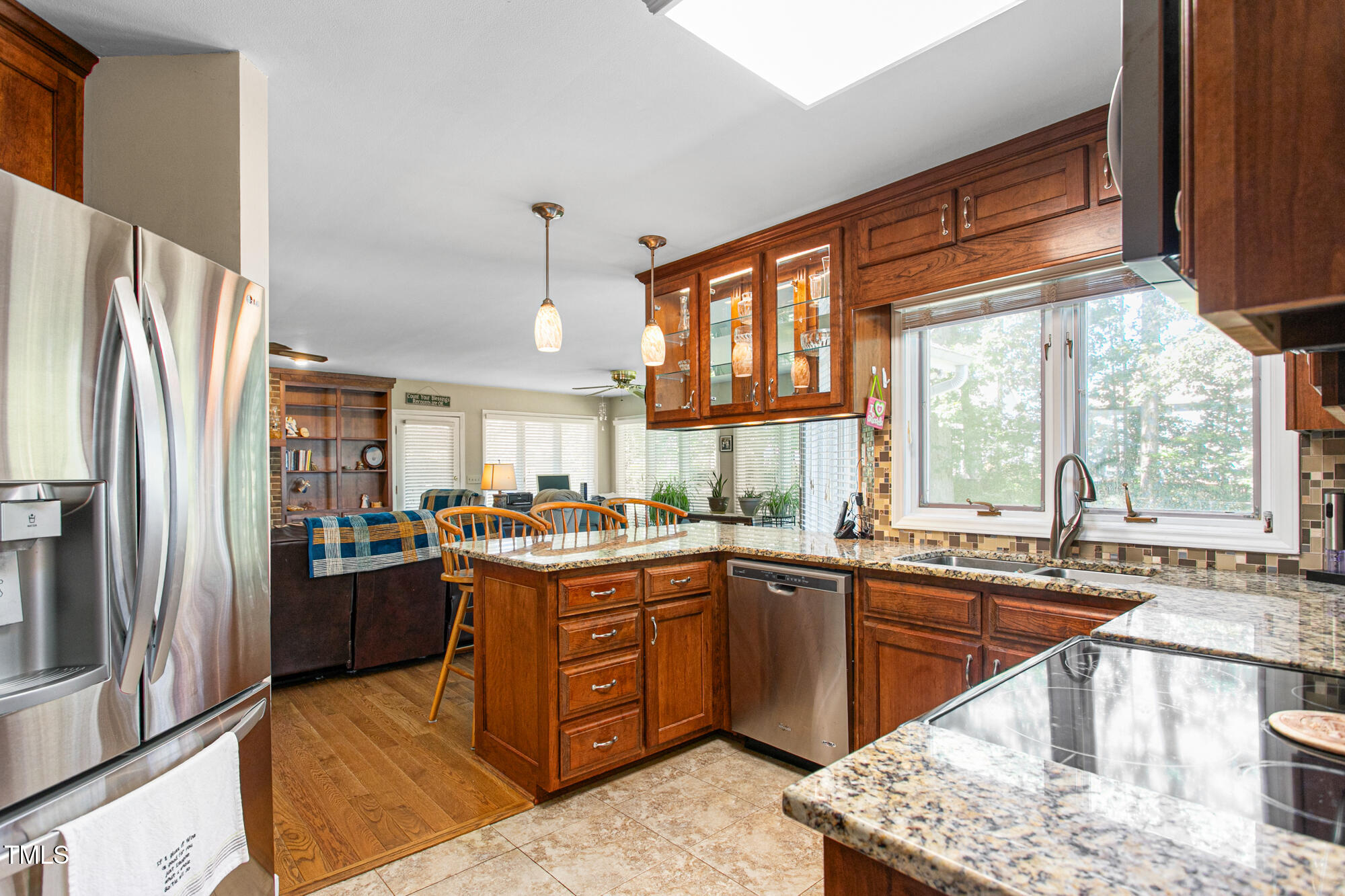 809 Brookview Drive Elon, NC 27244 - Photo 15 of 53 a kitchen with lots of counter top space and stainless steel appliances