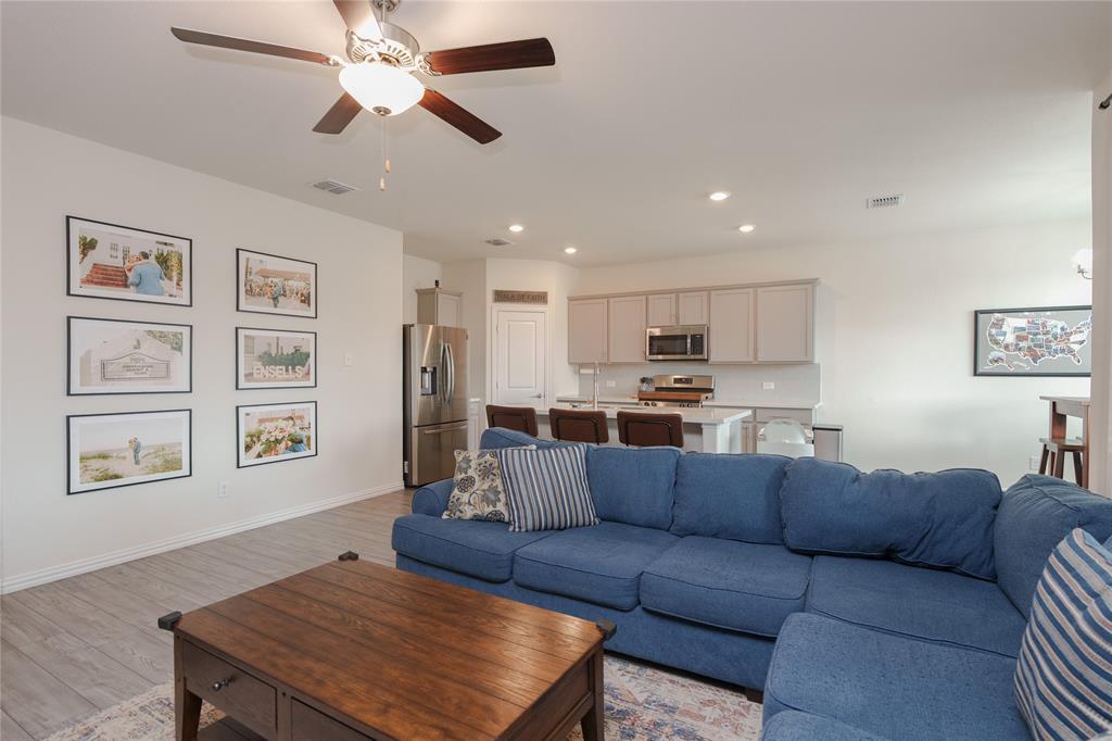 677 Ridgeback Trail Fort Worth, TX 76052 - Photo 12 of 40 a living room with furniture kitchen view and a window
