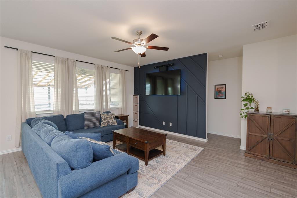 677 Ridgeback Trail Fort Worth, TX 76052 - Photo 14 of 40 a living room with furniture and a window