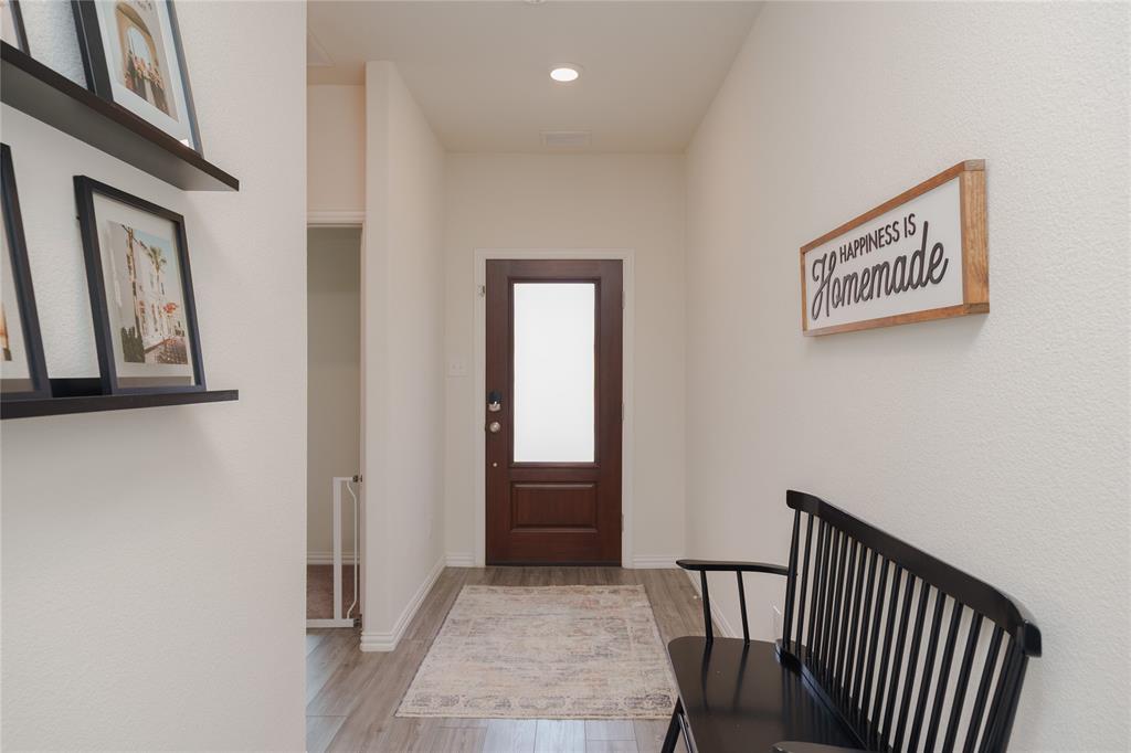 677 Ridgeback Trail Fort Worth, TX 76052 - Photo 5 of 40 a view of a hallway with entryway
