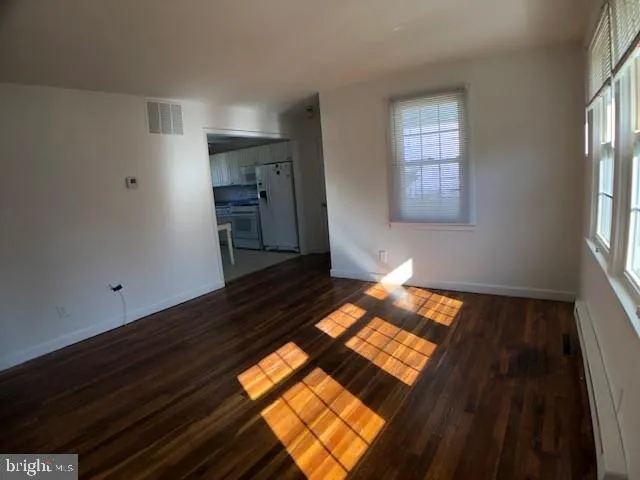 a view of an empty room and window