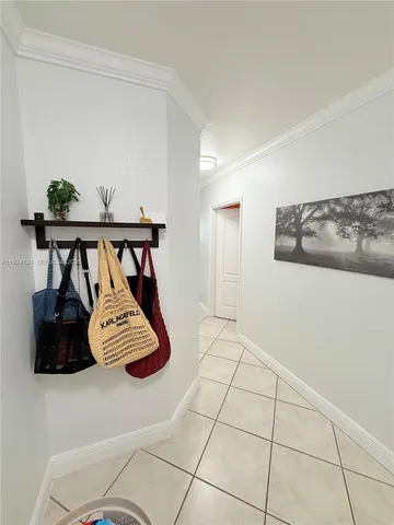 a view of room with furniture and wooden floor