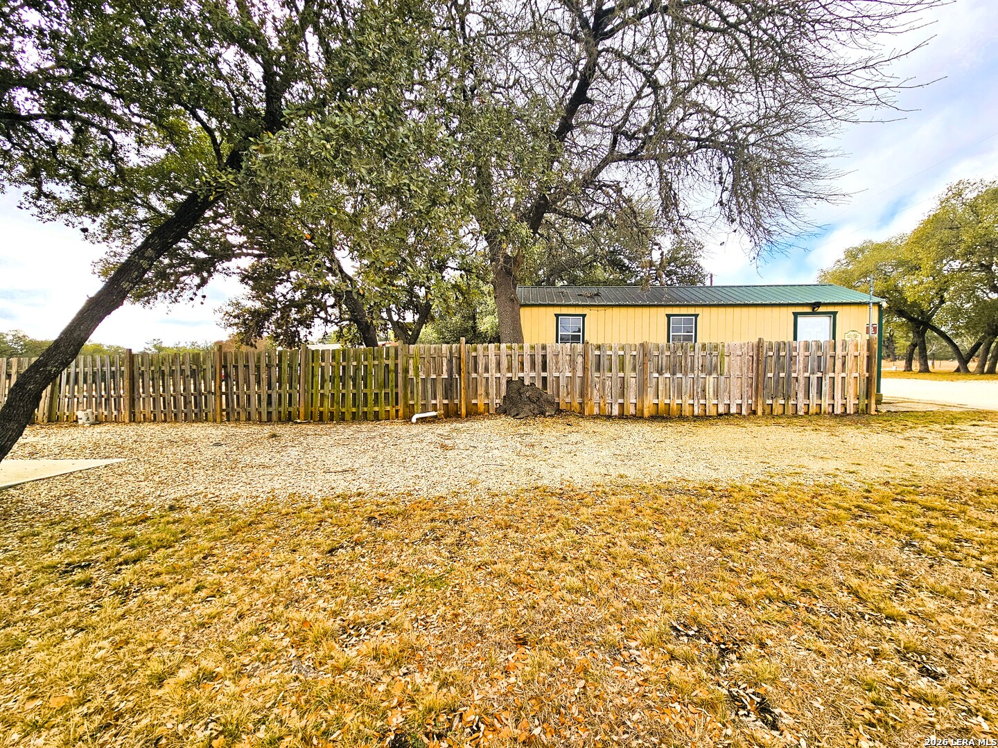 605 Lakeshore Lane Bandera, TX 78003 - Photo 18 of 32 a view of backyard with a garden