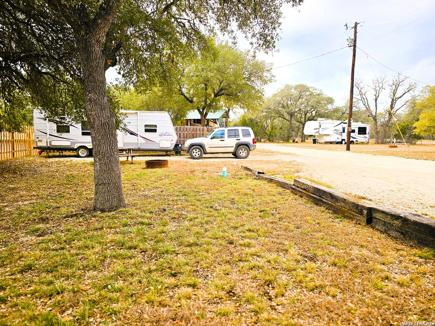 605 Lakeshore Lane Bandera, TX 78003 - Photo 21 of 32 a park view with large trees