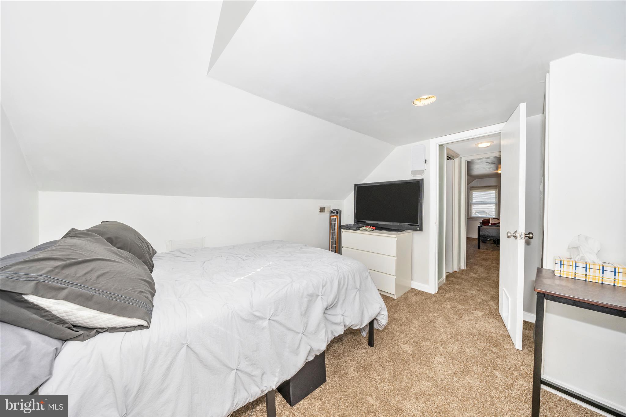 5618 Bartonsville Road Frederick, MD 21704 - Photo 31 of 53 a bedroom with a bed and a flat screen tv