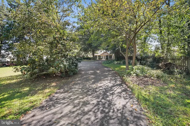 a view of a terrace with wooden fence
