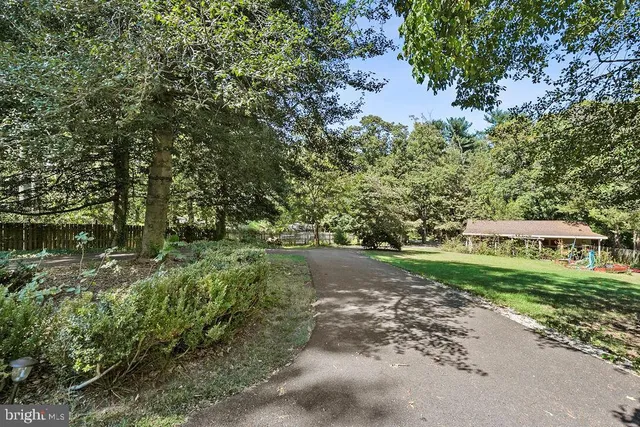 a front view of a house with swimming pool