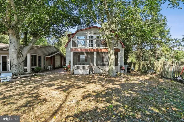 a view of a lake with a yard