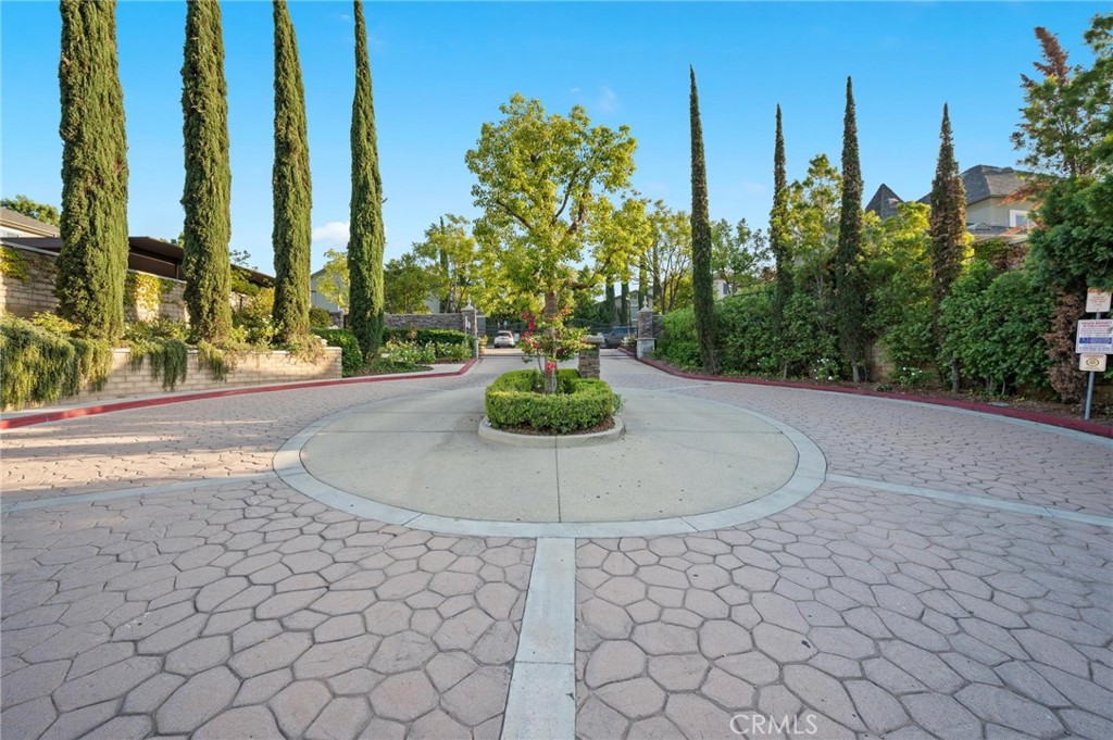 20000 Plum Canyon Road, Unit 316 Saugus, CA 91350 - Photo 26 of 27 a vase of flowers sitting on a table