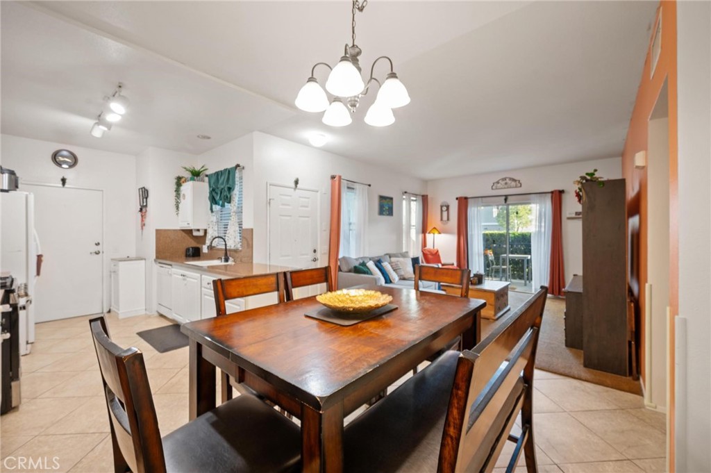 20000 Plum Canyon Road, Unit 316 Saugus, CA 91350 - Photo 6 of 27 a view of a dining room with furniture and window