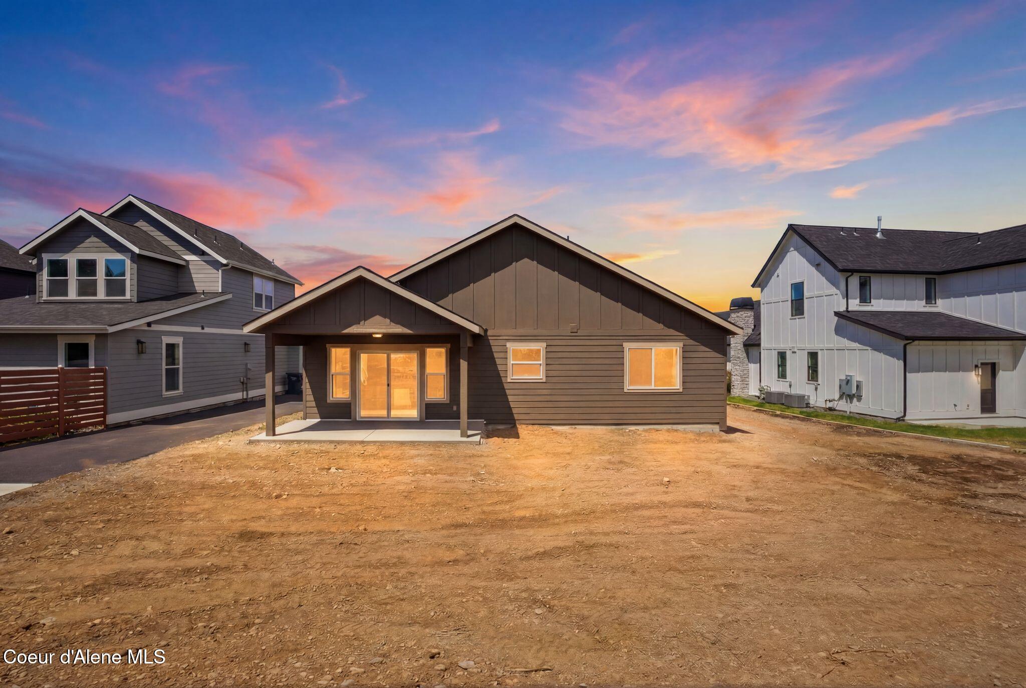 3476 Blaze Loop Post Falls, ID 83854 - Photo 28 of 33 Rear Exterior at Dusk