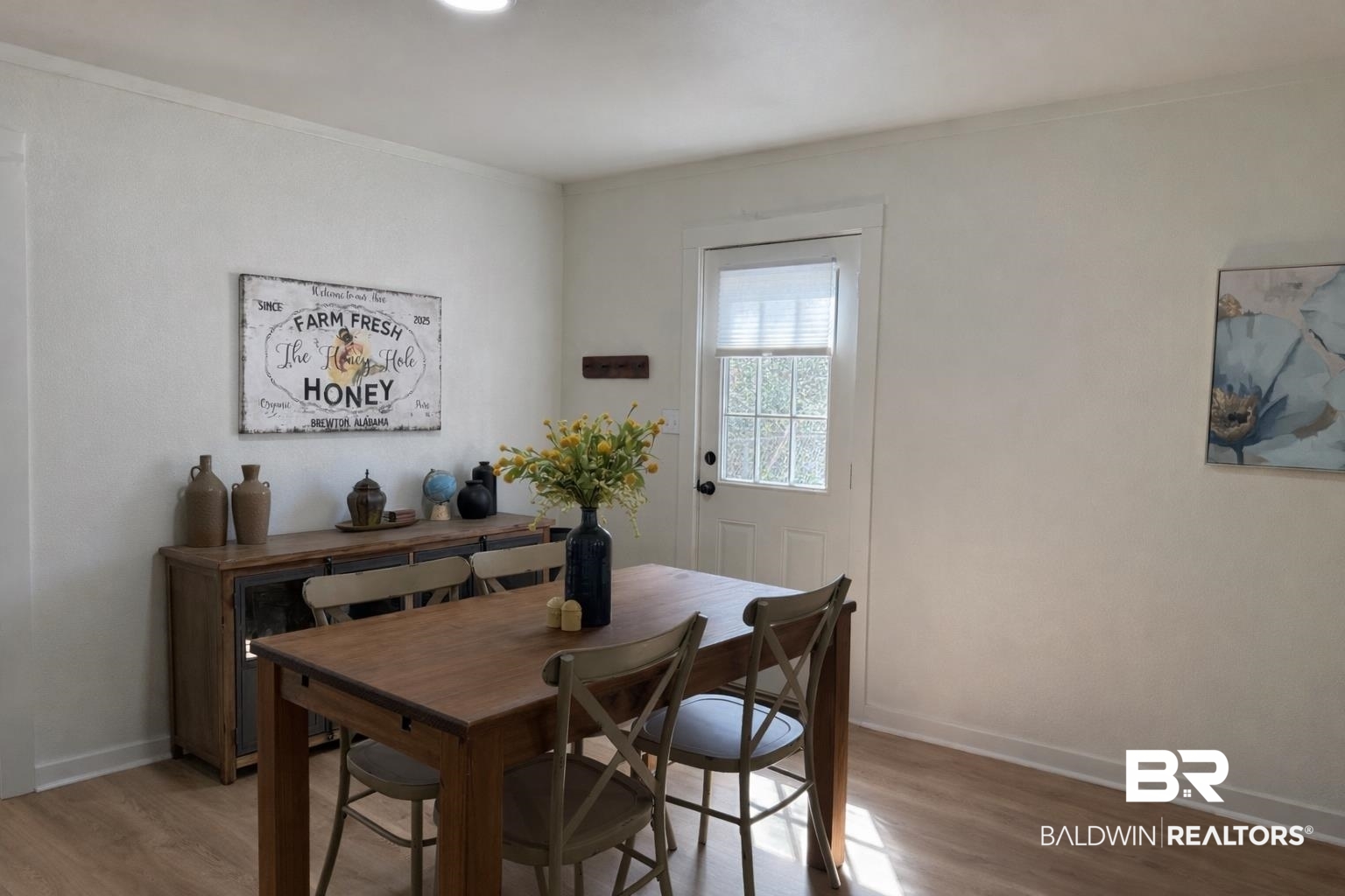 107 Dawson Street Brewton, AL 36426 - Photo 5 of 15 Dining area featuring wood finished floors and crown molding