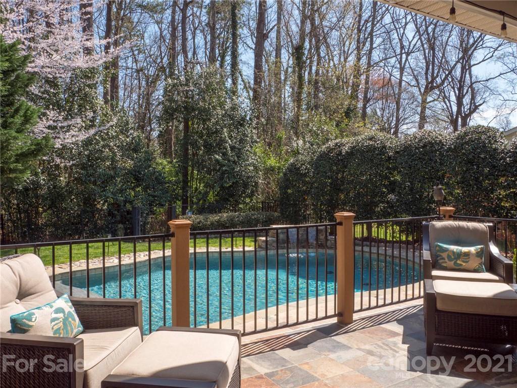 5725 Brookhaven Road Charlotte, NC 28210 - Photo 26 of 39 a view of a balcony with outdoor seating