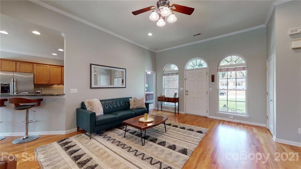 5725 Brookhaven Road Charlotte, NC 28210 - Photo 8 of 39 a living room with furniture and a window
