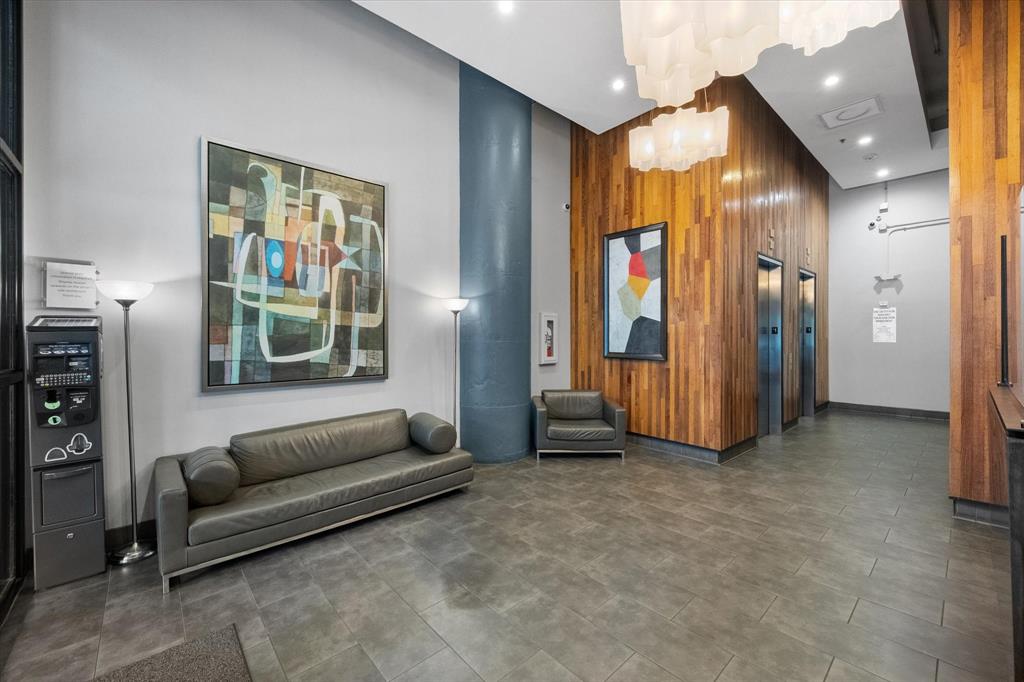 1122 Jackson Street, Unit 418 Dallas, TX 75202 - Photo 21 of 23 a view of livingroom with furniture and windows