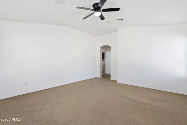 a view of a room with shelf on the wall
