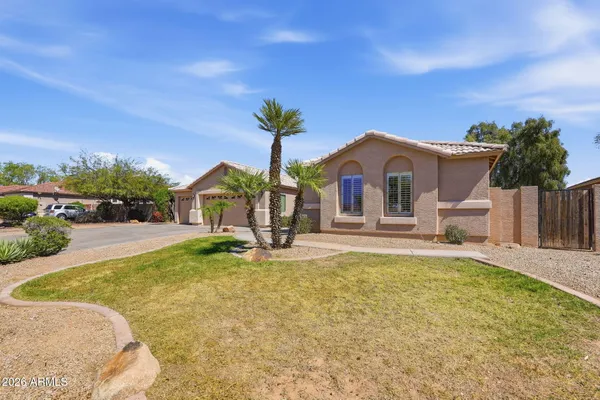 a view of house with yard outdoor seating and entertaining space