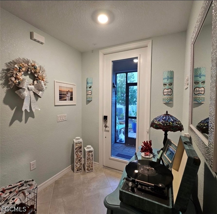 14191 Poppy Fld Loop, Unit 5312 Punta Gorda, FL 33955 - Photo 3 of 41 a room with gym equipment